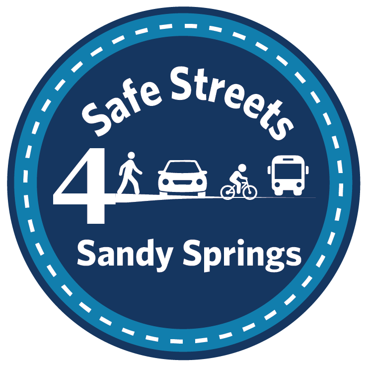 A circular logo for Safe Streets 4 Sandy Springs with a pedestrian, vehicle, bicycle, and public transportation pictured