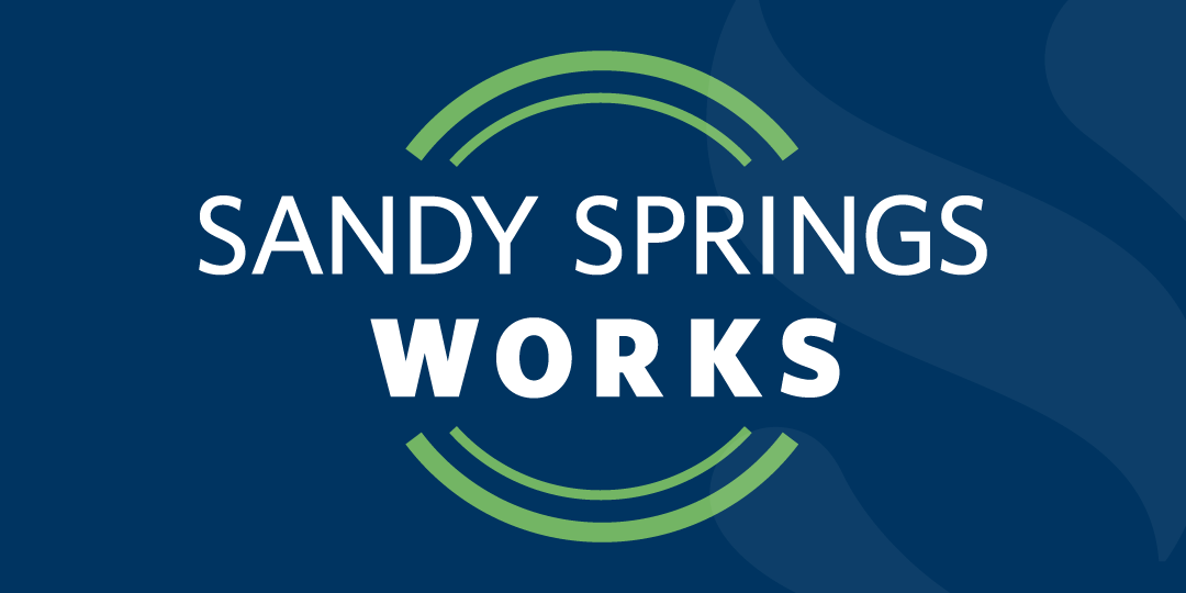 Logo with a dark blue background with the Sandy Springs logo in lighter blue, with text that reads Sandy Springs Works surrounded by 2 green semi circles